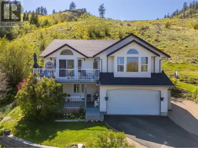 Welcome to St Andrews golf course! This turnkey family home is updated throughout & sits perched abo...