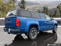Adventure awaits with this 2022 Chevrolet Colorado Z71, dressed in a head-turning Bright Blue Metall... (image 4)