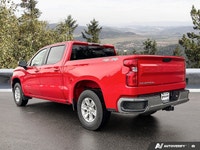 Conquer any road and turn heads with the vibrant Red Hot 2025 Chevrolet Silverado 1500 LT Crew Cab P... (image 2)