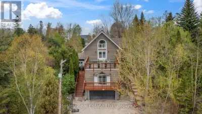 Luxury meets Lake Life. Nestled in the sought-after Shore Acres community on a half acre lot with pr...