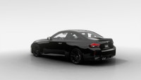 Découvrez cette BMW M2 Coupé neuve, arborant une robe Noir Saphir métallisé et une sellerie en cuir... (image 1)