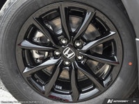 The 2026 Honda CR-V Hybrid EX-L AWD in stunning Silver is a versatile SUV that blends efficiency wit... (image 7)