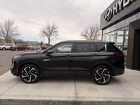 The 2023 Mitsubishi Outlander PHEV LE is a plug-in hybrid SUV that combines fuel efficiency, electri... (image 3)