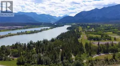 Nestled between the serene Bow River and Brewster’s Golf Course, this brand-new single-family home o...