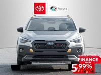 The 2024 Subaru Crosstrek Wilderness AWD in a striking silver finish with an automatic AWD transmiss... (image 1)