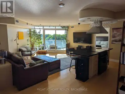 Rarely available oversized one-bedroom plus den with two baths, nearly 1,000 sq. ft. of interior liv...