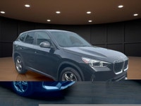 Experience the luxury of driving a black 2023 BMW X1 xDrive28i Sports Activity Vehicle with its comp... (image 3)