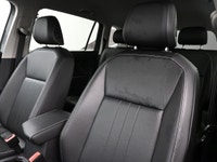 Volkswagen's Tiguan is a European take on an American classicâ€”the SUV. It offers more athletic han... (image 6)