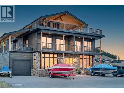 Luxury lake retreat with exceptional flexibility just steps from Lake Koocanusa. Located directly ac...