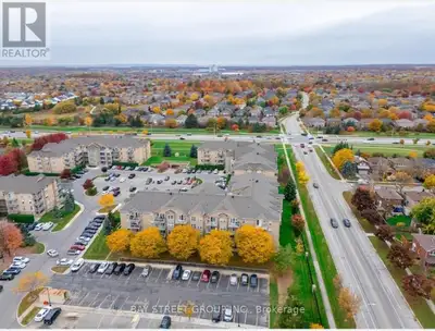 Prestigious Neighborhood in Glen Abbey, South Facing, Corner unit facing green space. New benjamin m...