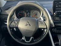 Experience the dynamic drive of the new 2026 Mitsubishi Eclipse Cross SE S-AWC in an elegant Silver... (image 3)