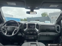 Command the road and beyond in this robust 2021 Chevrolet Silverado 1500 LT Trail Boss. Designed for... (image 9)