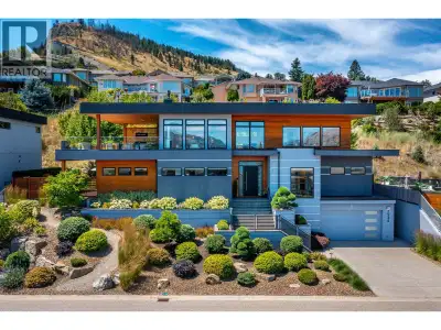 Drawing inspiration from Frank Lloyd Wright, this architecturally stunning home blends modern elegan...