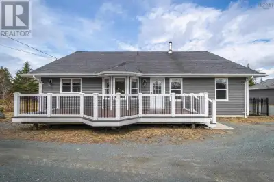 Escape to tranquility with this stunning 2,600 sq ft custom bungalow nestled on 2.24 acres in pictur...