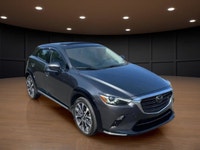 Get ready to conquer the roads with the 2022 Mazda CX-3 GT, a sophisticated gray SUV that combines a... (image 3)