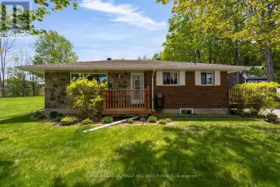 WELL-KEPT COUNTRYSIDE BUNGALOW WITH KEY UPDATES & READY FOR YOUR VISION! Start with over an acre of...