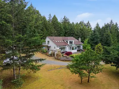 Welcome to this exceptional 5.76-acre country estate offering quality craftsmanship and incredible v...