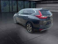 The 2018 Honda CR-V EX-L AWD in striking gray is the perfect blend of versatility and style, designe... (image 6)