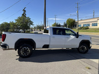This vehicle is equipped with: 6.6L 8 Cylinder Gas Engine 4Wheel Drive Long Box Heated Steering Whee... (image 5)