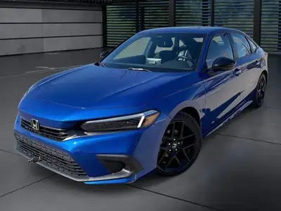 The 2024 Honda Civic Sedan Sport in stylish Blue is a front-wheel-drive masterpiece that promises im...