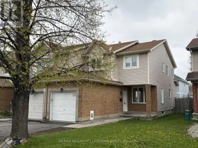 Great bright three bedroom, three bathroom end unit townhome for rent close to schools, parks and sh...
