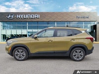 Embrace the thrill of the open road with this 2024 Kia Seltos EX, a vibrant green SUV boasting a rem... (image 1)