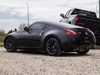 This Nissan 370Z is a sleek and sporty coupe designed for drivers who appreciate performance, style,... (image 5)