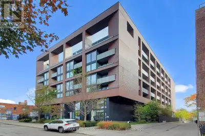 Welcome to 383 Sorauren Ave #808 - where industrial edge meets everyday ease in the heart of Roncesv...