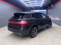 The 2022 Lincoln Nautilus Reserve AWD in a striking green finish combines elegance and performance w... (image 2)