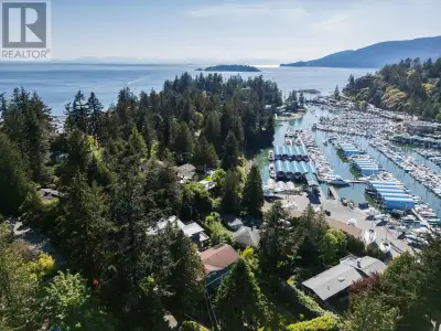 A beautiful Eagle Harbour Bungalow, 5755 Telegraph Trail is unlike any other home in the area. Perch...