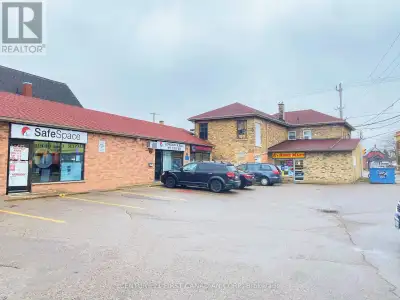 Prime 5-unit plaza on a high-traffic corner lot offering exceptional visibility and exposure along m...