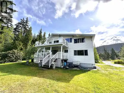 * PREC - Personal Real Estate Corporation. Year-Round Lake Living! 3- bedroom, 2-bathroom, 2 Living...