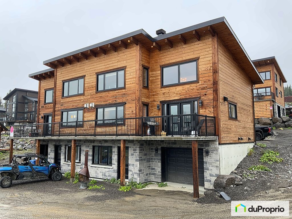 $570,000 - Semi-detached for sale in St-David-de-Falardeau — photo 1