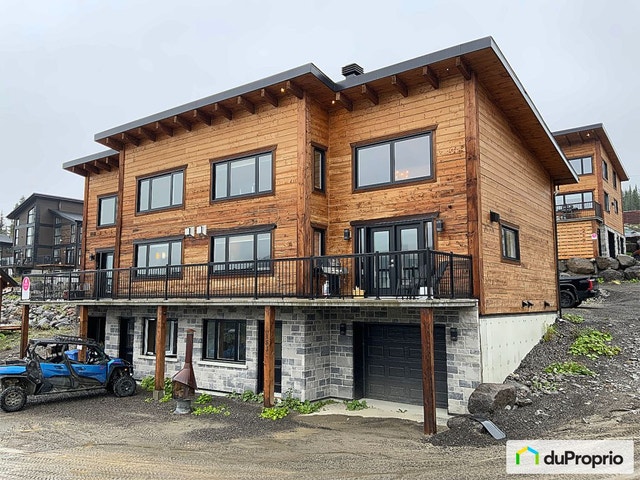 $570,000 - Semi-detached for sale in St-David-de-Falardeau — photo 1