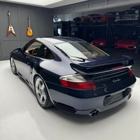 Check out this 2003 Porsche 911 Twin Turbo. This is the very desirable Midnight Blue Metallic with N... (image 2)