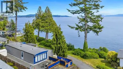 Fulfill your dream of oceanfront living—without the oceanfront price tag! This stylish,contemporary...