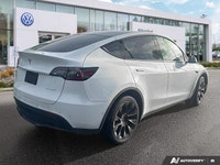 This Tesla Model Y boasts a Electric engine powering this Automatic transmission. Wireless Phone Con... (image 4)