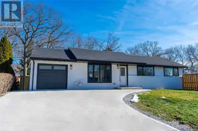 Located in the Oak Acres neighbourhood off Lakeshore Road, this custom, one of a kind, fully renovat...