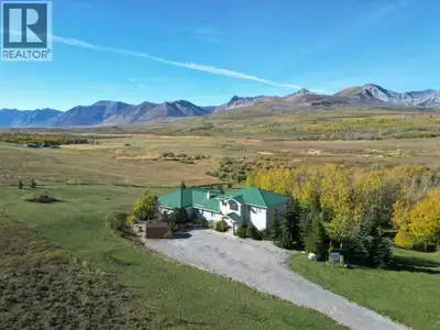 This exceptional property, located just north of the breathtaking Waterton National Park, offers a r...