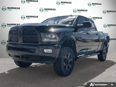 The 2016 Ram 2500 Laramie, finished in an elegant black exterior paired with a sophisticated black i...