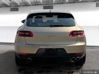 The 2015 Porsche Macan comes equipped with all-wheel drive, heated leather seats, a heated steering... (image 3)