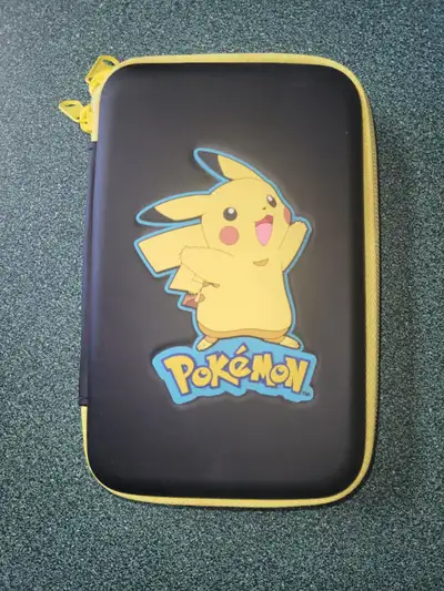 Pokemon pikachu 3DS gaming travel case excellent condition. $50.00 Wii Paul Gibson guitar has scratc...