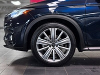 The 2021 INFINITI QX50 Essential Tech is a luxury compact crossover that bridges the gap between the... (image 8)