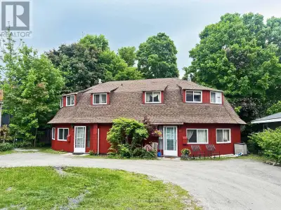 UNIQUE CUSTOM BUILT DUPLEX/HOME OPPORTUNITY! Known as 'The Round House' on Church Street, in the tow...
