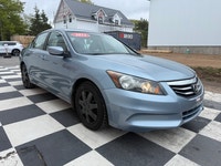 A reliable midsize sedan with a comfortable interior, smooth performance, and practical convenience... (image 2)