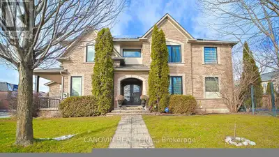 Fabulous 4-bedroom family home on desirable street in executive Westmount community. Bright and spac...