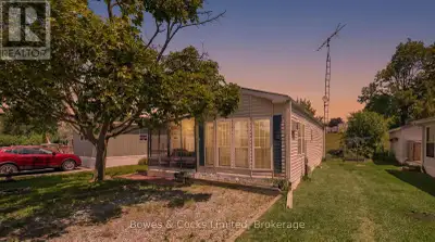 Tucked away in the peaceful waterfront community of Shady Acres Trailer Park in Keene, this charming...
