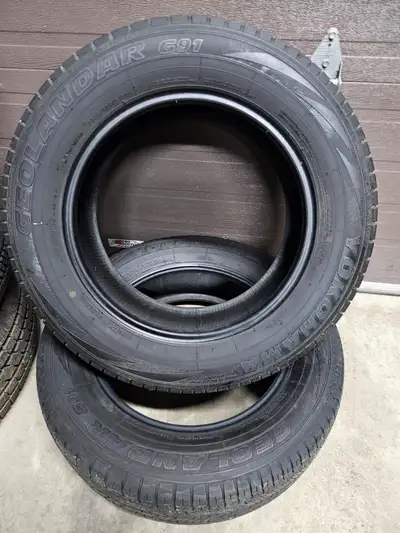 Nice pair of Yokohama Geolander G91 all season tires. 2 x 235/65/17 6/32nd tread remaining #3765