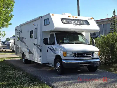Guarantee RV Calgary's LARGEST selection of pre-owned inventory - / - Single Slide Ivory SE Class C...