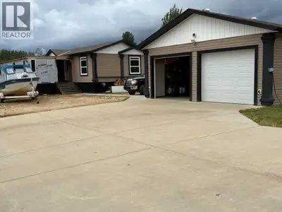 Set on a spacious 1/3 acre lot, this beautifully maintained 20' wide mobile home offers the perfect...